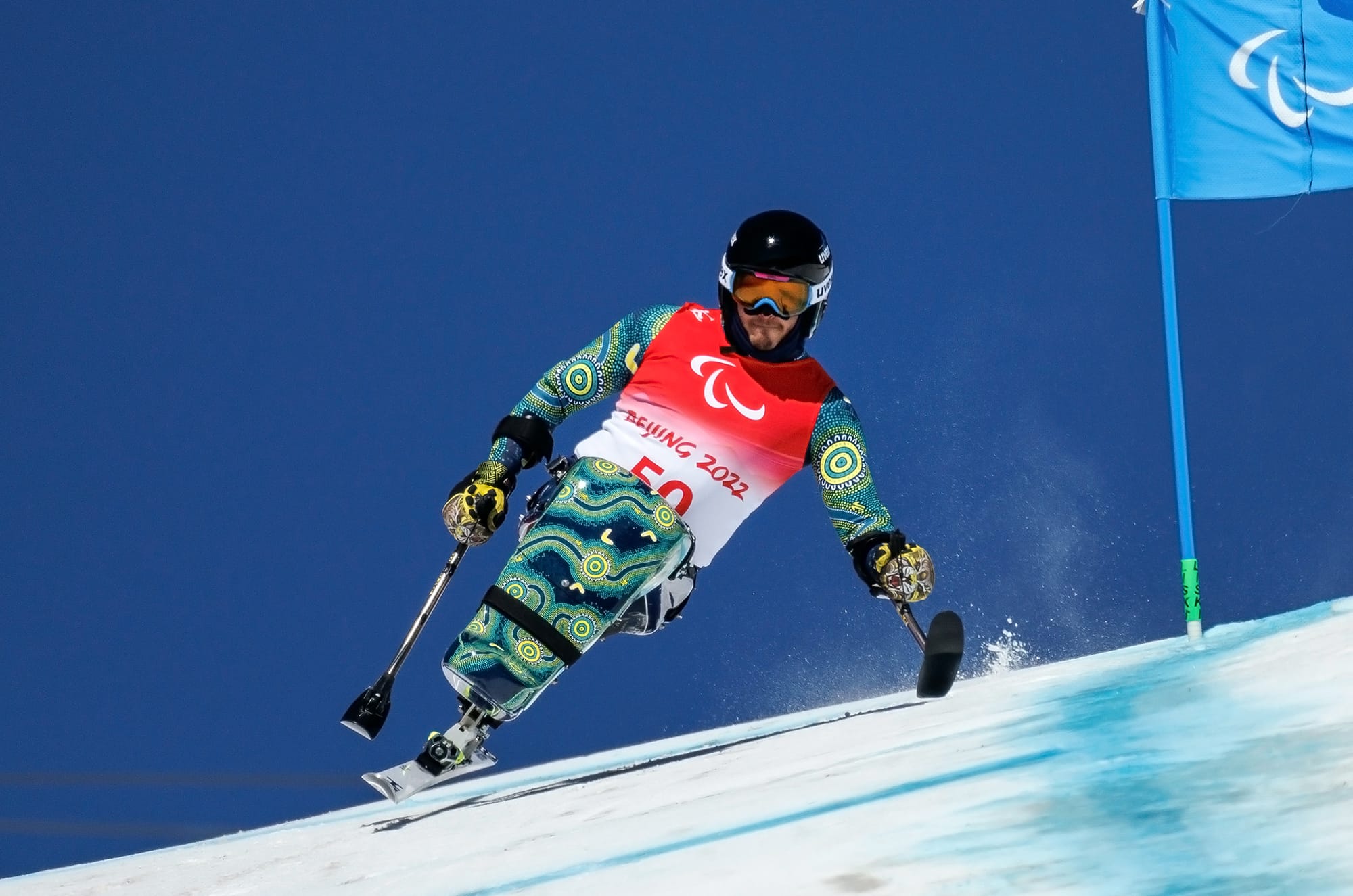 Sam Tait finding air during the downhill at the 2022 Paralympic Games. PHOTO: Simon Bruty for OIS
