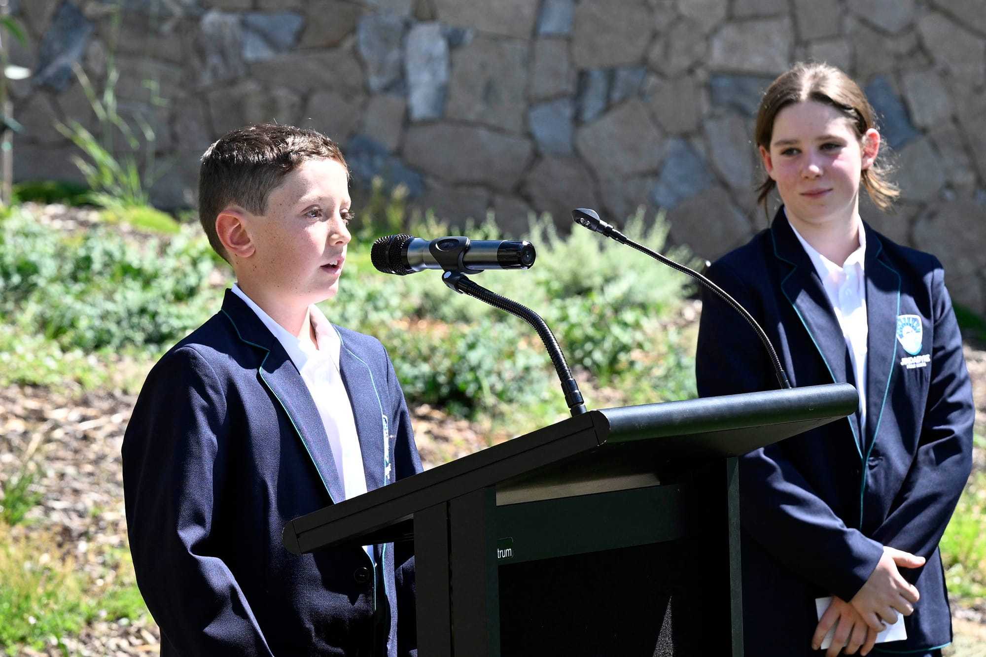 Primary school captain Hugo Bateman during his speech with Matilda Forsdyke.