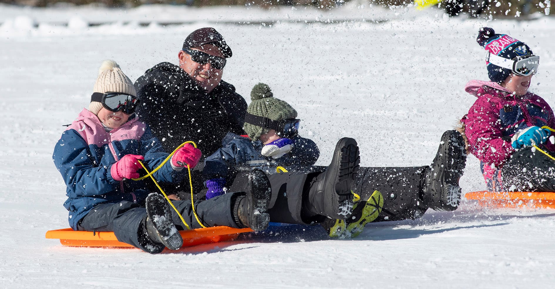 The Jones family from Harden loving toboggan life.